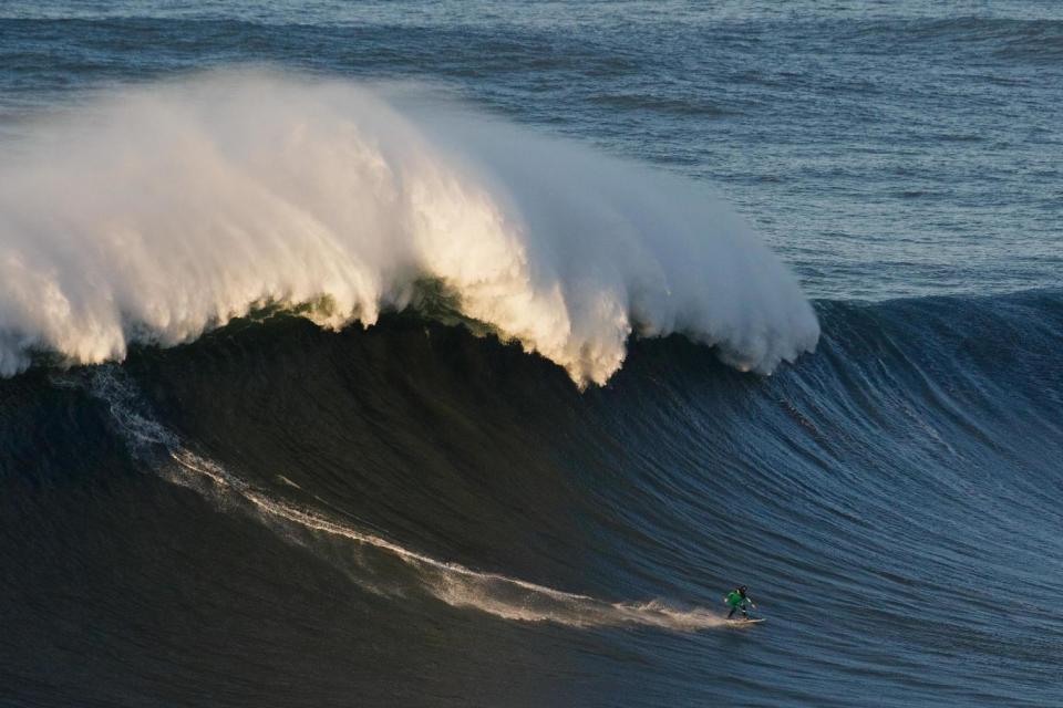 Monster | Cotton surfs at Nazare in 2016 Photo: Getty Images
