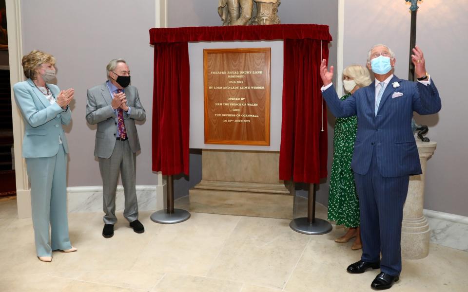 Prince Charles and Camilla, Duchess of Cornwall, unveil the plaque, watched by Lord Lloyd Webber and Lady Madeleine - Tim P Whitby/Pool via Reuters