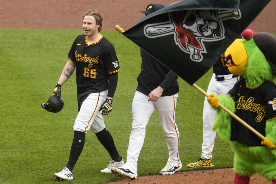 Pittsburgh Pirates' Jack Suwinski (65) walks off the field after driving in the winning run with a walkoff single off Colorado Rockies relief pitcher Nick Mears during the ninth inning of a baseball game in Pittsburgh, Saturday, May 4, 2024. (AP Photo/Gene J. Puskar)
