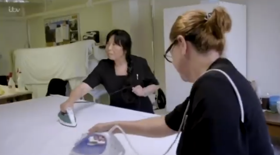 It takes two people to iron one sheet. Photo: ITV