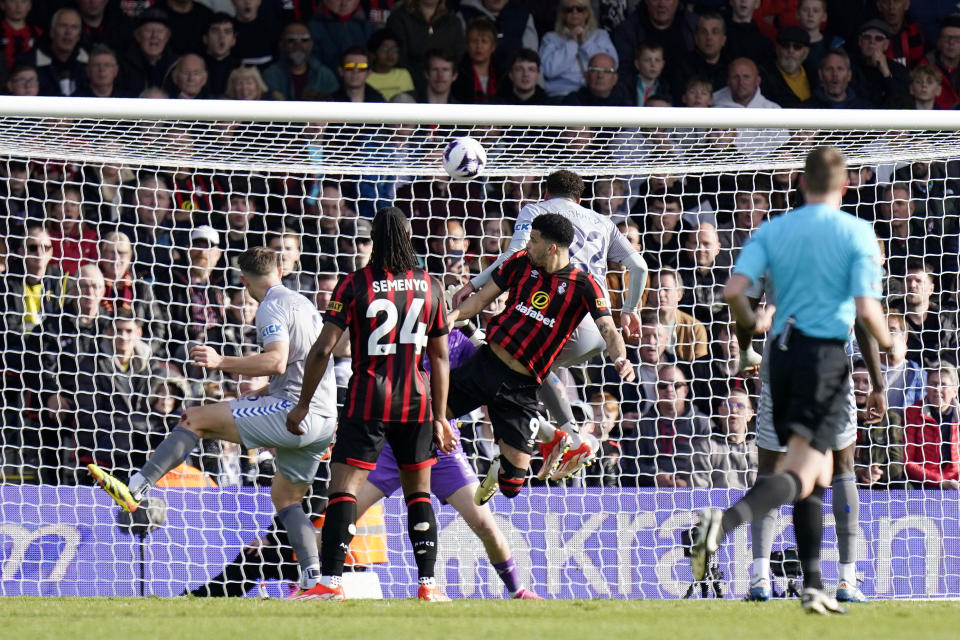 Bournemouth's Dominic Solanke, centre, scores the opening goal during the English Premier League soccer match between AFC Bournemouth vs Everton at the Vitality Stadium, Bournemouth, England, Saturday, March 30, 2024. (Andrew Matthews/PA via AP)