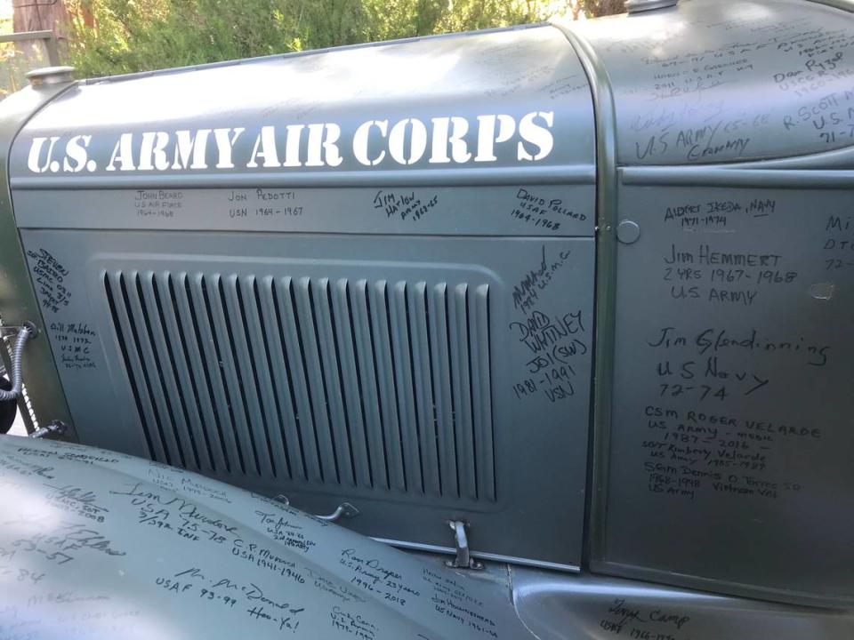 About 700 to 800 signatures from U.S. military veterans adorn the 1931 Model A Ford town car that Jay Burbank of Cambria converted to look like a World War II General’s staff car.