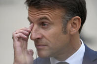 French President Emmanuel Macron listens to Portugal's Prime Minister Luís Montenegro before a working lunch, Wednesday, June 19, 2024 at the Elysee Palace in Paris. Earlier this month, President Emmanuel Macron dissolved the lower house of France's parliament in a surprise announcement sending voters back to the polls, after his party was handed a humbling defeat by the far-right in the European elections. (AP Photo/Thibault Camus)