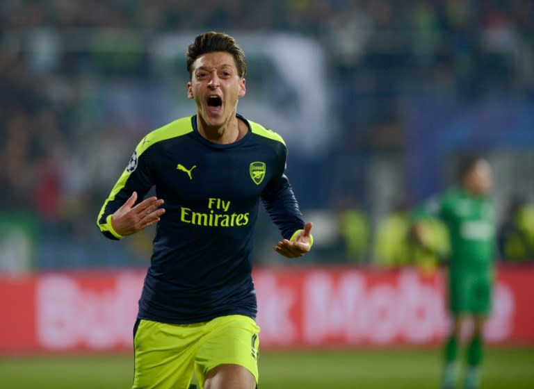 Arsenal’s German midfielder Mesut Ozil celebrates after scoring a goal against PFC Ludogorets on November 1, 2016 at the Vassil Levski stadium in Sofia