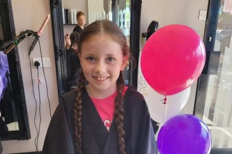 Amari before getting her hair cut to donate to The Little Princess Trust -Credit:Submitted