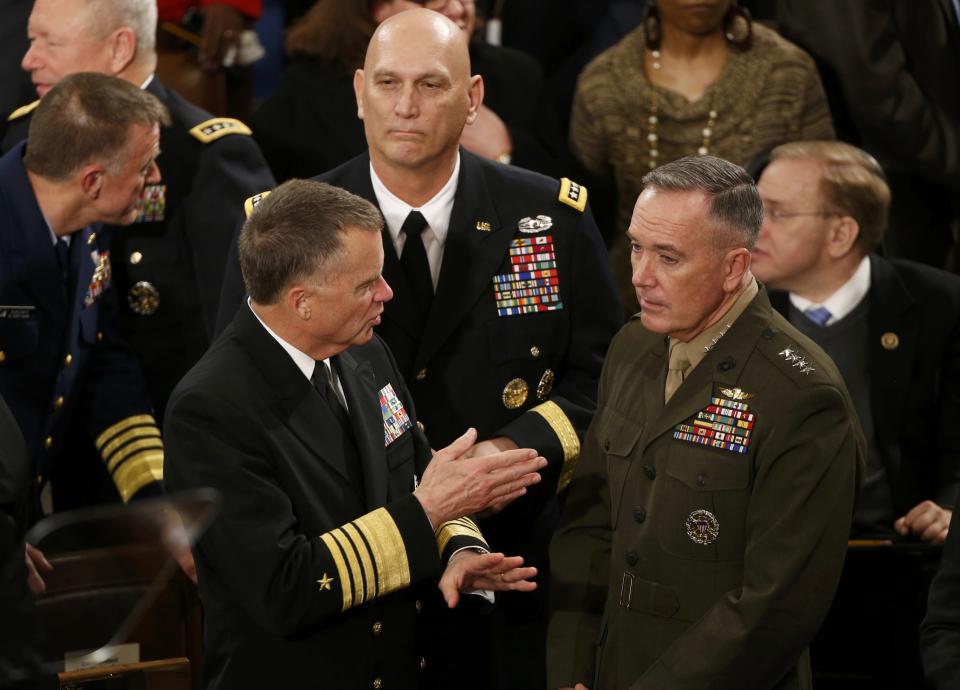 Members of the Joint Chiefs of Staff await U.S. President Barack Obama's State of the Union address to a joint session of the U.S. Congress on Capitol Hill in Washington