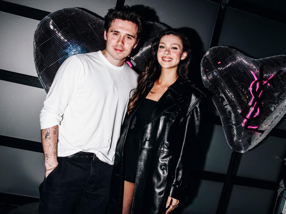 Brooklyn and Nicola Peltz Beckham attend YSL's Celebration of Candy Glaze in February 2024.