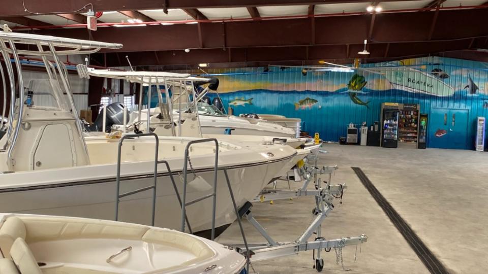 This refurbishment center is taking in used boats, both from individuals and club fleets, and sprucing them up for sale. - Credit: Courtesy Boateka