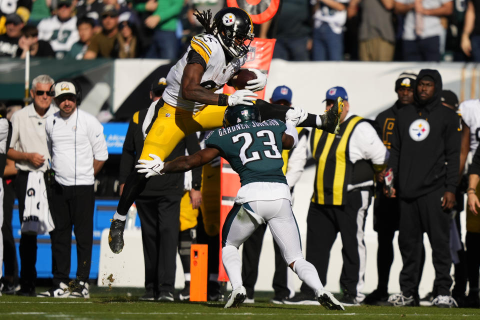 Pittsburgh Steelers linebacker Marcus Allen (27) attempts to leap over Philadelphia Eagles safety C.J. Gardner-Johnson during the second half of an NFL football game between the Pittsburgh Steelers and Philadelphia Eagles, Sunday, Oct. 30, 2022, in Philadelphia. (AP Photo/Matt Slocum)