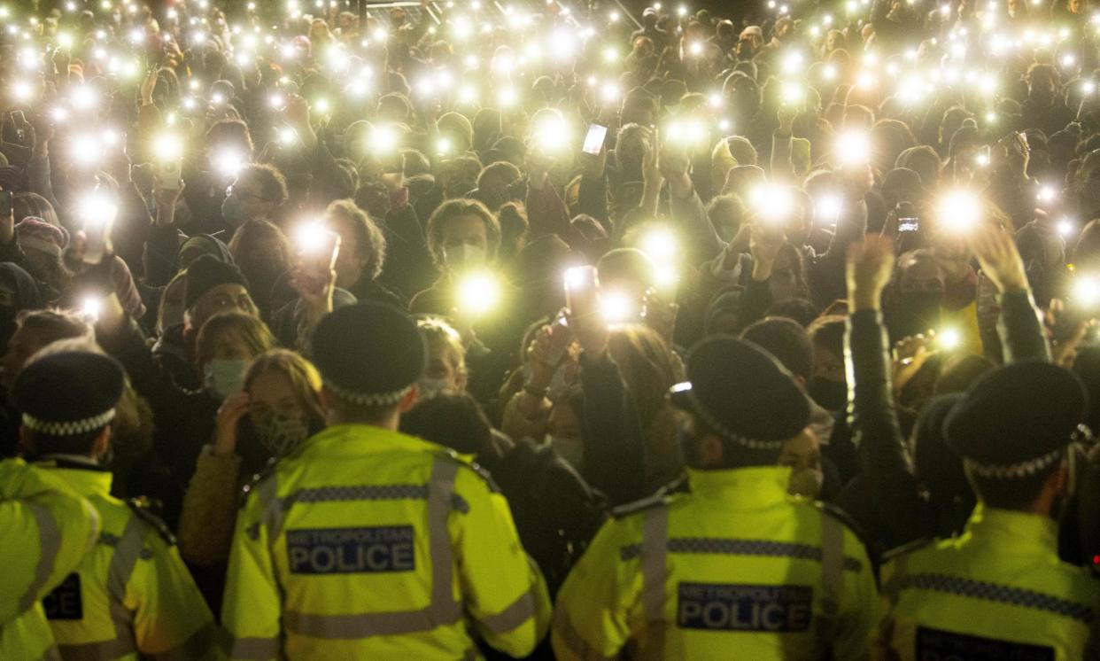 <span>People turn on their phone torches in Clapham Common at a vigil in 2021 for Sarah Everard who was murdered by Wayne Couzens.</span><span>Photograph: Victoria Jones/PA</span>