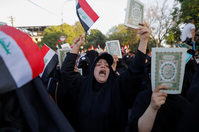 Iraqis demonstrate against the desecration of the Koran in Sweden, in Baghdad