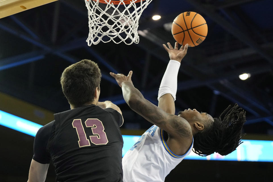 UCLA guard Sebastian Mack, right, shoots as Lafayette center Mike Bednostin defends during the second half of an NCAA college basketball game Friday, Nov. 10, 2023, in Los Angeles. (AP Photo/Mark J. Terrill)