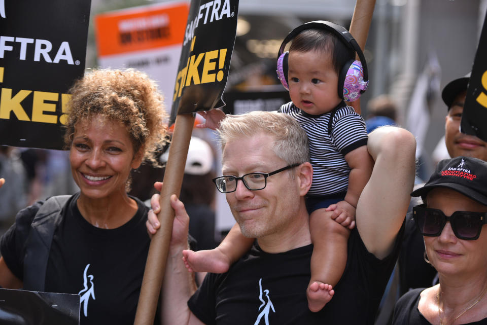 NEW YORK, NY - JULY 18: Michelle Hurd and Anthony Rapp walk the picket line in support of the SAG-AFTRA and WGA strike on July 18, 2023 in New York City.  (Photo by NDZ/Star Max/GC Images) *** Local Caption ***Michelle Hurd;Anthony Rapp