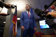 FILE - In this Aug. 26, 2021 file photo, Georgia Gov. Brian Kemp speaks during a news conference at Lockheed Martin in Marietta, Ga. The rewards of an early Donald Trump endorsement will be on display Saturday, Sept. 25 in Georgia. A three-man ticket of candidates he’s backing in 2022 Republican primaries for statewide office will take the stage with him. (AP Photo/Brynn Anderson, File)