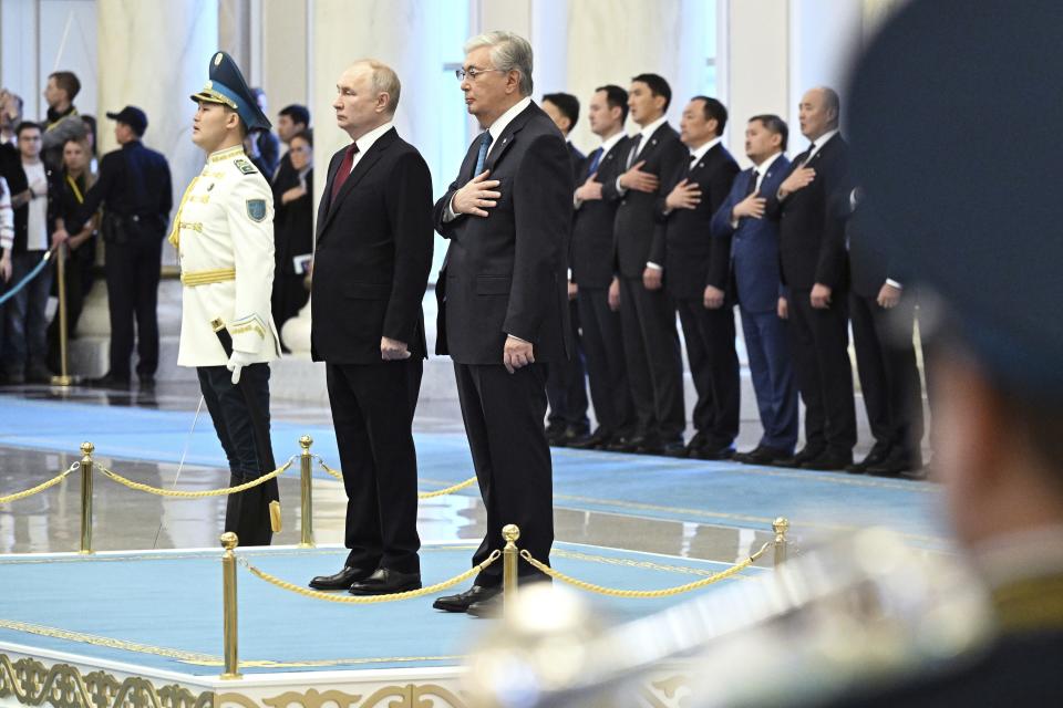 Kazakh President Kassym-Jomart Tokayev, center right, and Russian President Vladimir Putin, center left, attend an official welcome ceremony at the Akorda Presidential residence in Astana, Kazakhstan, Thursday, Nov. 9, 2023. (Pavel Bednyakov, Sputnik, Kremlin Pool Photo via AP)