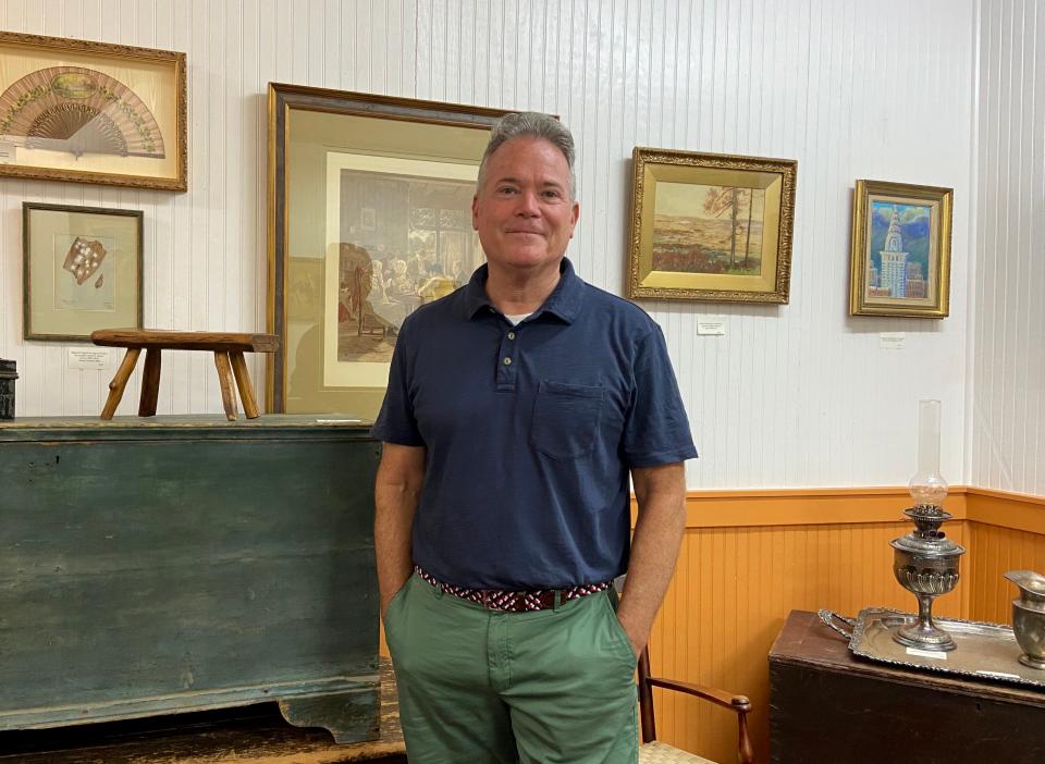 Frederick O'Brien, owner of O'Brien's Antiques & Art, on 14 Byers St. at the Wharf in Staunton