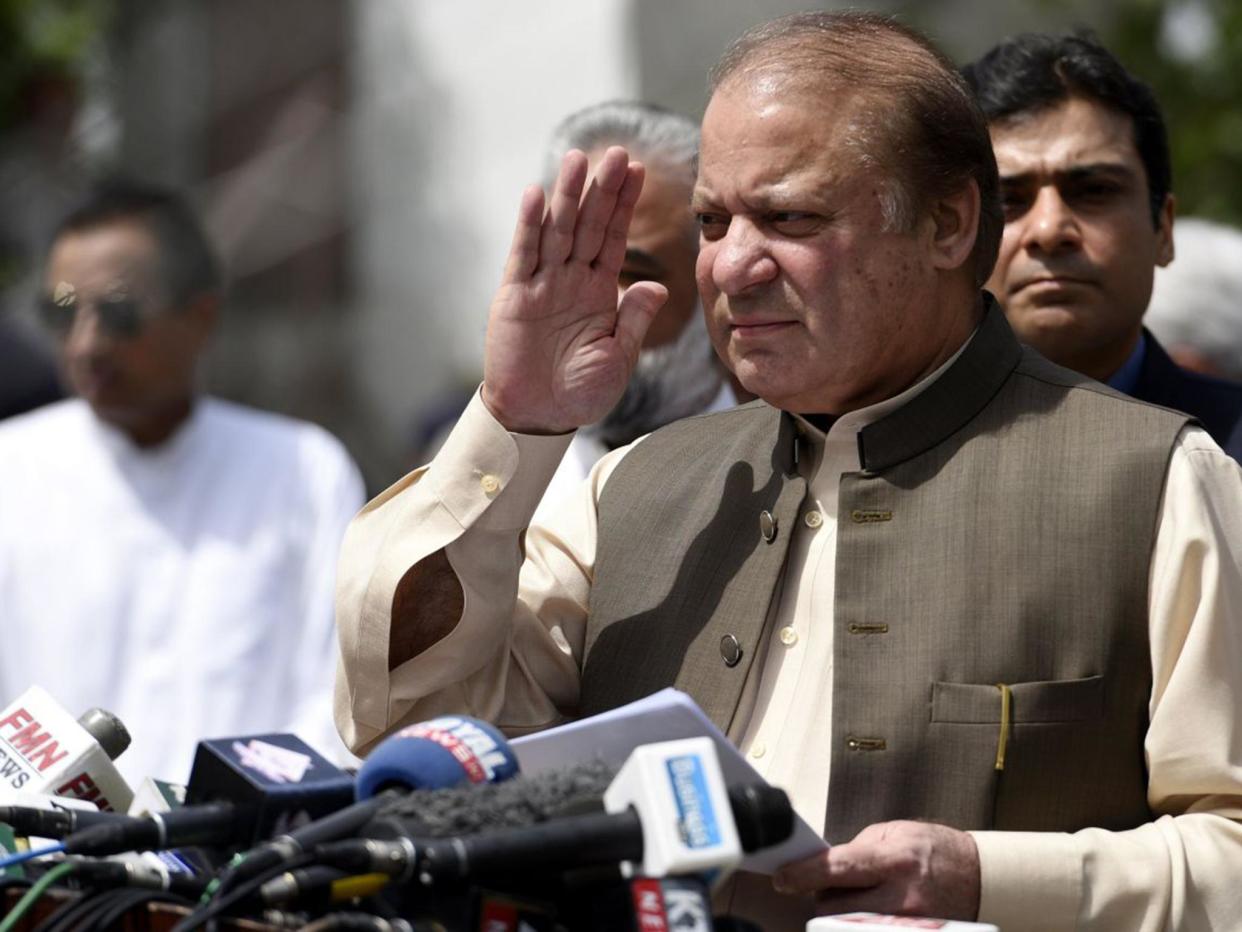 Nawaz Sharif talking to journalists after appearing before an investigation team formed by the Supreme Court of Pakistan: EPA