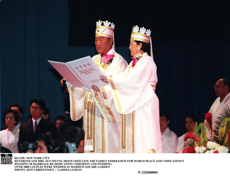 Reverend Moon and his wife Hak Ja Han at a blessing ceremony in 1998.