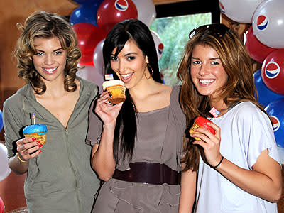 Two hours into the cupcake eating race, Kim Kardashian takes the lead.