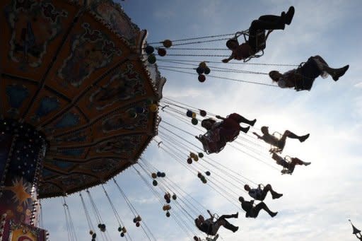 Visitors ride a chairoplane at the Theresienwiese Oktoberfest fair grounds in Munich, Germany. With about eight million beers downed each year at the Oktoberfest, you might expect a few items to go awry, but the lost-and-found office at the world's top beer fest really has seen it all