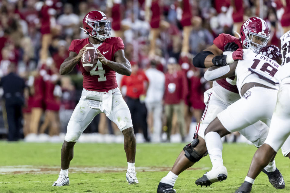 Alabama's Jalen Milroe (4) is one of three players competing for the starting quarterback job this season. (AP Photo/Vasha Hunt)