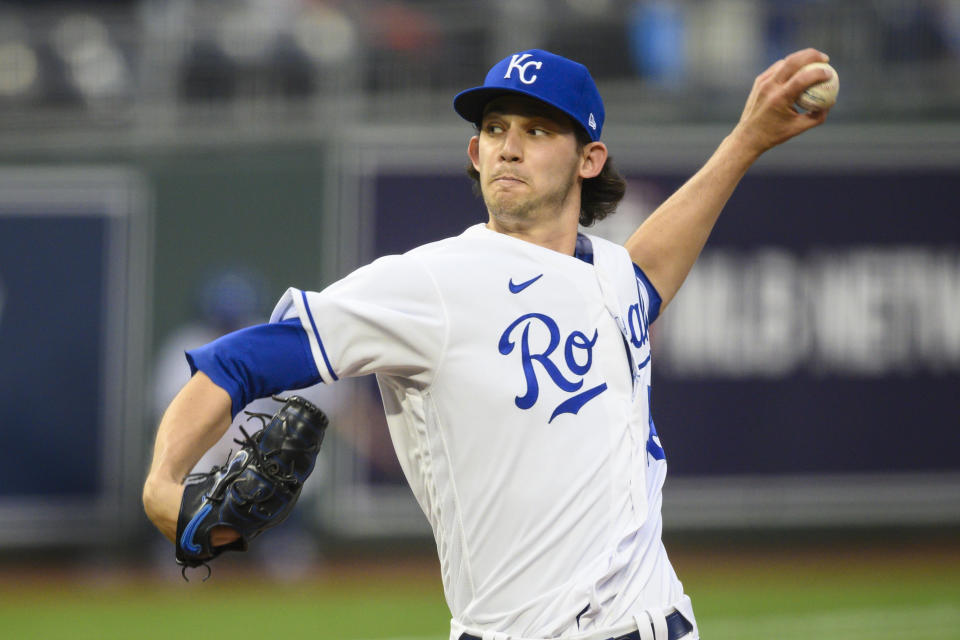 Kansas City Royals starting pitcher Daniel Lynch throws against the Cleveland Indians during the first inning of a baseball game Monday, May 3, 2021, in Kansas City, Mo. (AP Photo/Reed Hoffmann)