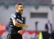 Inter Milan's Mauro Icardi celebrates after scoring against Sassuolo during their Serie A soccer match at San Siro stadium in Milan September 14, 2014. REUTERS/Stefano Rellandini