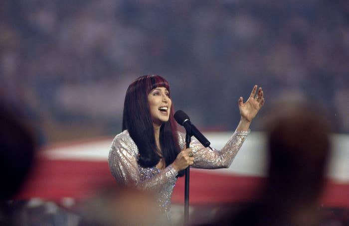 Cher performing