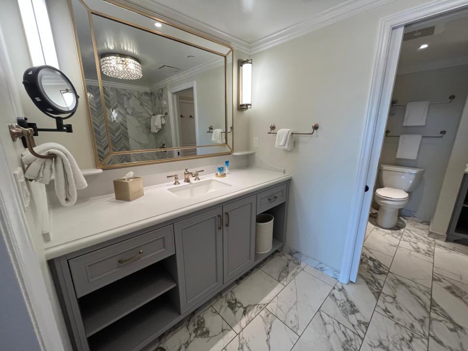 view of the vanity and toilet areas in a one bedroom villa at disney's riviera resort