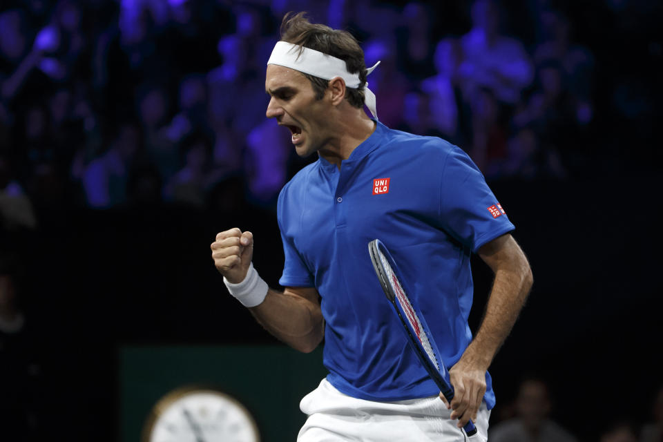 Team Europe's Roger Federer celebrates after winning a point against Team World's Nick Kyrgios during their match at the Laver Cup tennis event in Geneva, Switzerland, Saturday, Sept. 21, 2019. (Salvatore Di Nolfi/Keystone via AP)