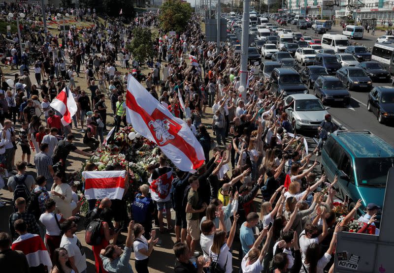 People gather to commemorate a killed protester in Minsk