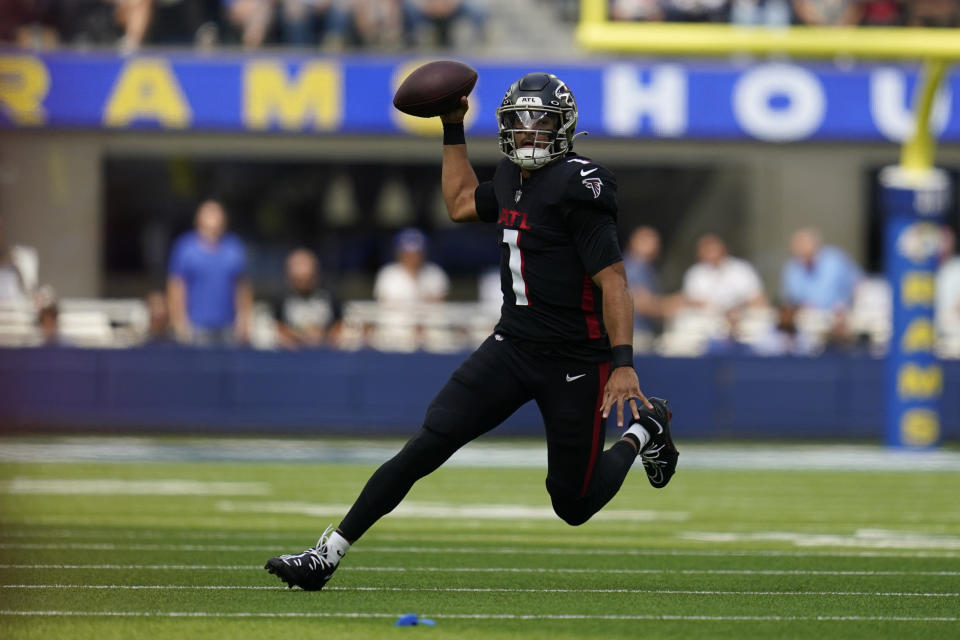 Atlanta Falcons quarterback Marcus Mariota scrambles during the first half of an NFL football game against the Los Angeles Rams, Sunday, Sept. 18, 2022, in Inglewood, Calif. (AP Photo/Ashley Landis)