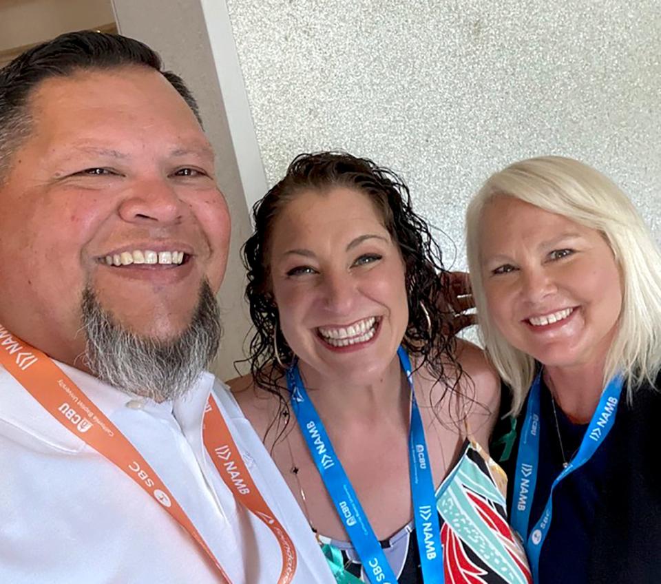 The Rev. Mike Keahbone,  senior pastor of First Baptist Church of Lawton, is shown with sexual abuse survivors and advocates Jules Woodson and Tiffany Thigpen at the Southern Baptist Convention's annual meeting in Anaheim, California. 