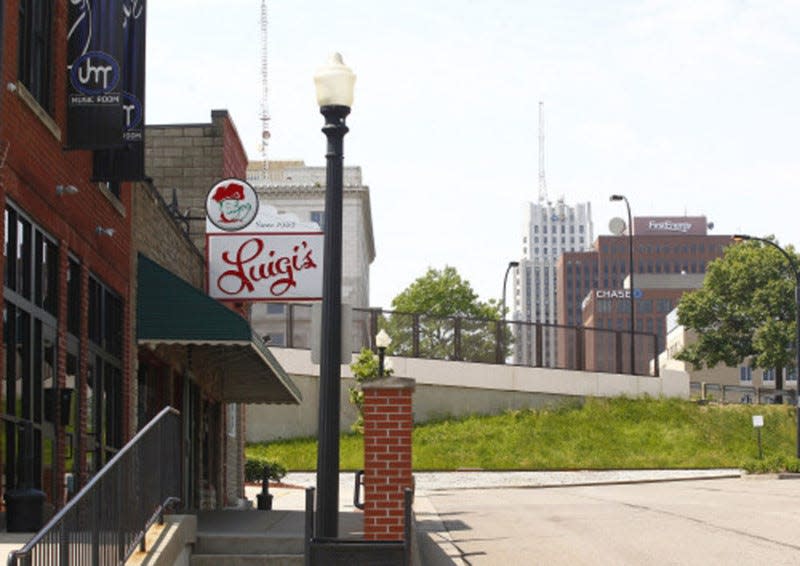 Luigi's and Jilly's Music Room sit yards from the former site of the Green Turtle Hotel, one of the many Black-owned businesses that once thrived in the neighborhood on and around North Howard Street known as "Little Harlem."