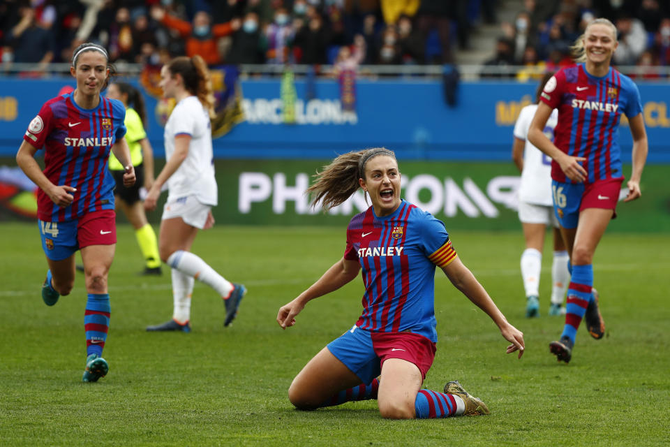 FILE - Barcelona's Alexia Putellas celebrates after scoring her side's second goal during the Women's Spanish La Liga soccer match between Barcelona and Real Madrid at Johan Cruyff stadium in Barcelona, Spain, Sunday, March 13, 2022. (AP Photo/Joan Monfort, File)