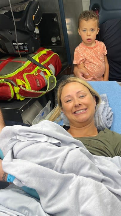 Katie Vasquez and baby in ambulance after giving birth at home. (Photo by: Katie Vasquez).