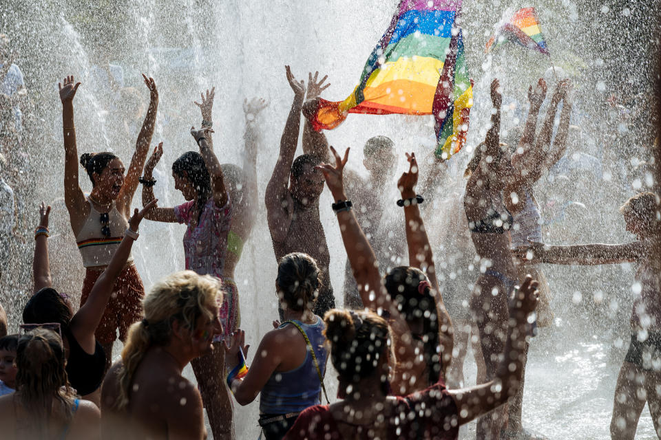Image: People celebrate in Washington Square Park during New York City's Pride Parade on June 27, 2021. (Mathias Wasik / dpa/picture alliance via Getty Images)