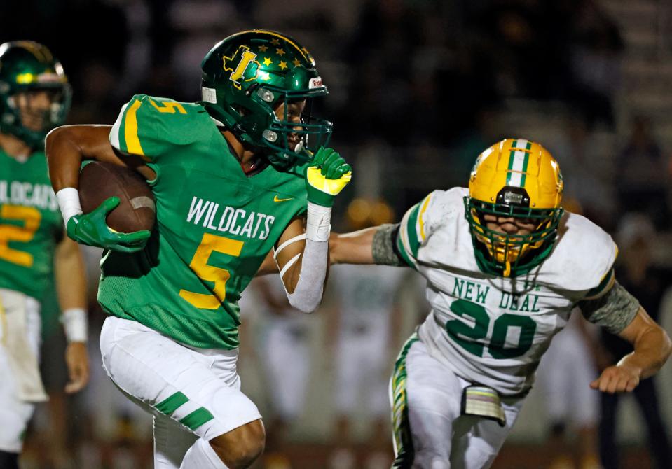 Idalou's Malakhi Brisco (5) runs with the ball during the game against New Deal, Friday, Sept. 24, 2021, in Idalou, Texas.
