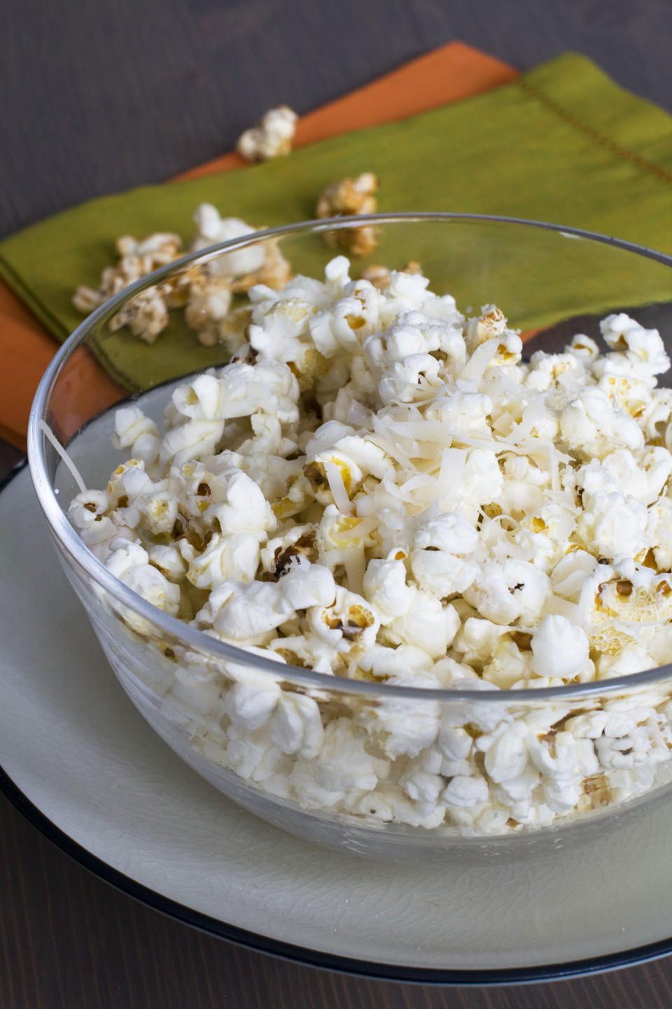 In this image taken on Jan. 28, 2013, Stovetop Popcorn Many Ways with finely grated parmesan cheese is shown served in a bowl in Concord, N.H. (AP Photo/Matthew Mead)