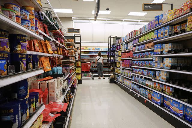 <p>Joe Raedle / Getty Images</p> The Minneapolis-based big box chain is cutting prices on both food and non-perishable items — a move aiming to win back customers after four straight quarters of decline.