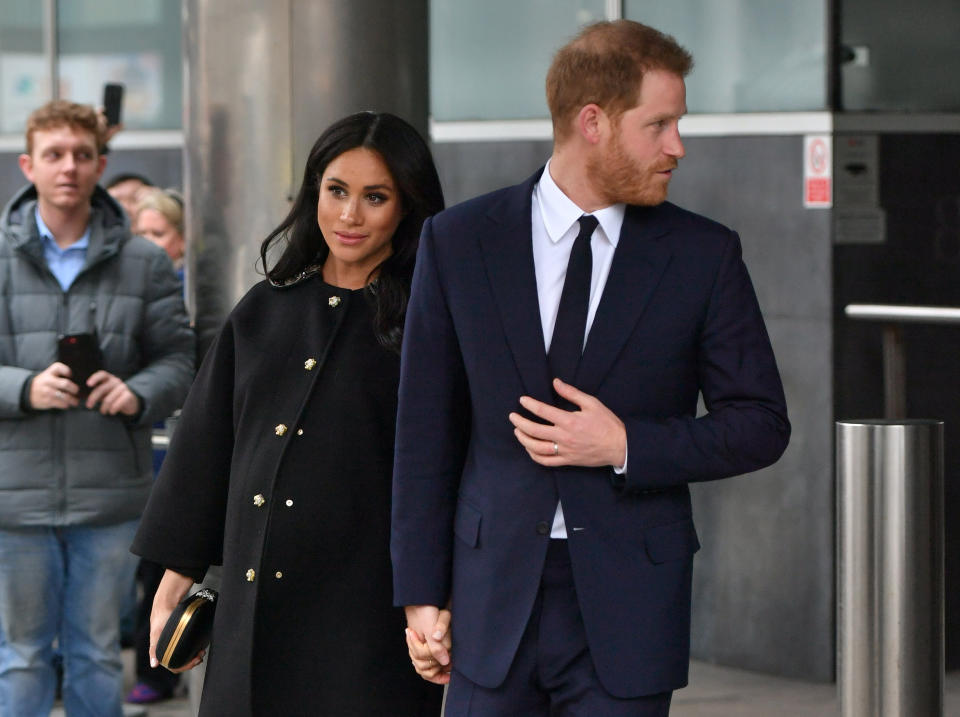 Meghan and Harry leaving New Zealand House in London, where they signed the book of condolence for the victims of the Christchurch terror attack [Photo: PA]