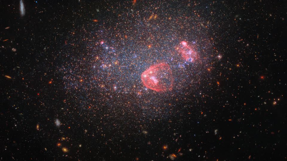 One billion stars twinkle within the dwarf galaxy UGC 8091, which is 7 million light-years away. - NASA/Hubble/ESA
