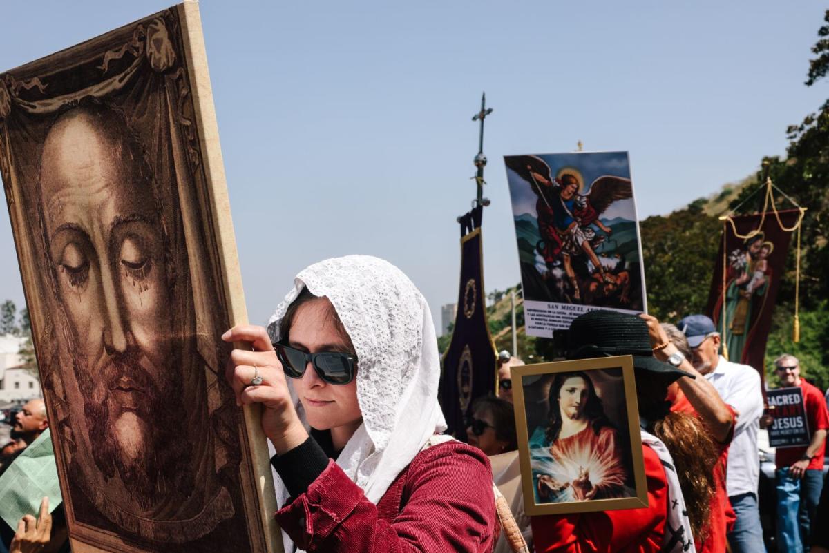 Catholic and other religious protesters gather at Dodger Stadium