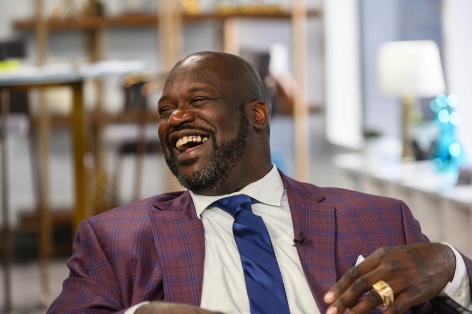 DAILY POP -- Episode 190912 -- Pictured: (l-r) Daily Pop guest Shaquille O'Neal reacts to the Daily Pop co-hosts -- (Photo by: Nick Agro/E! Entertainment/NBCU Photo Bank via Getty Images)