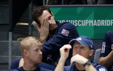 Andy Murray is dejected as he looks on from the stands - Credit: Getty Images