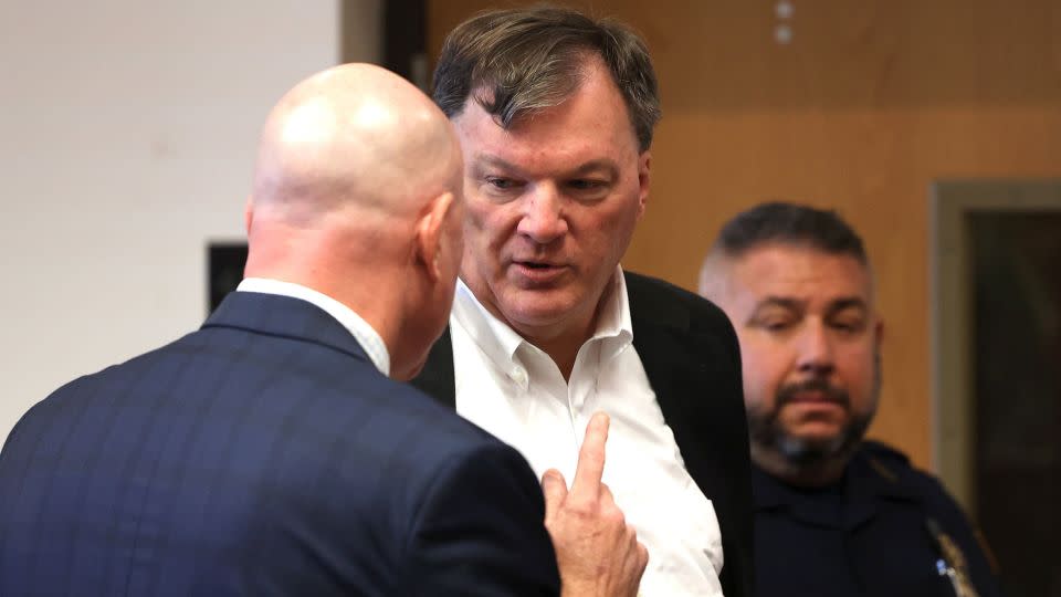 Rex Heuermann appeared with his lawyer Michael Brown, left, at Suffolk County Court in Riverhead, New York, on Wednesday. - James Carbone/Pool/Newsday
