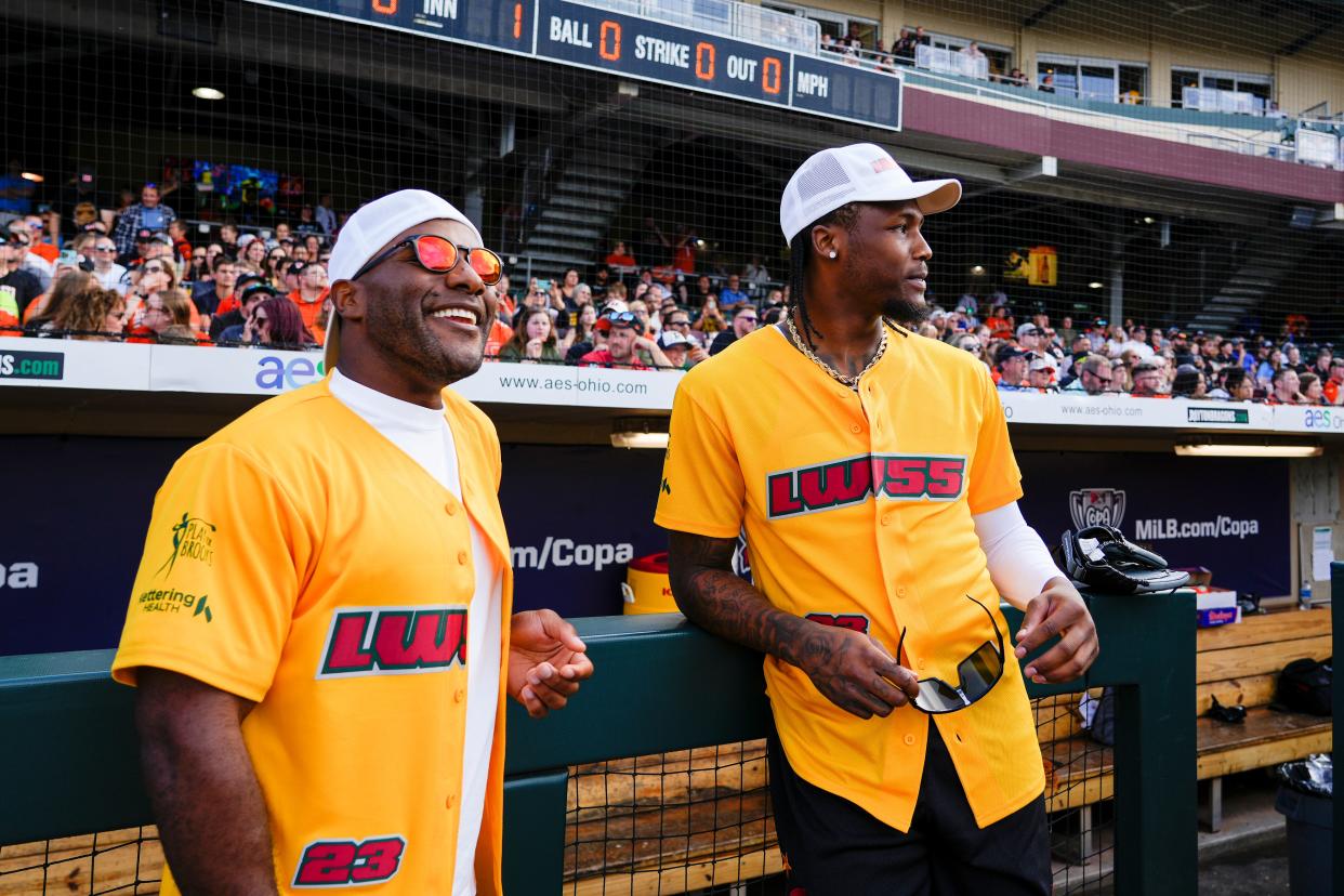 Former Bengals running back Giovani Bernard (left) with Tee Higgins