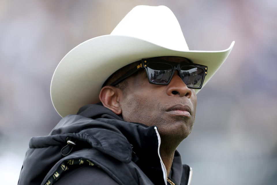 BOULDER, COLORADO – APRIL 22: Head coach Deion Sanders of the Colorado Buffaloes watches as his team warms up prior to their spring game at Folsom Field on April 22, 2023 in Boulder, Colorado. (Photo by Matthew Stockman/Getty Images)