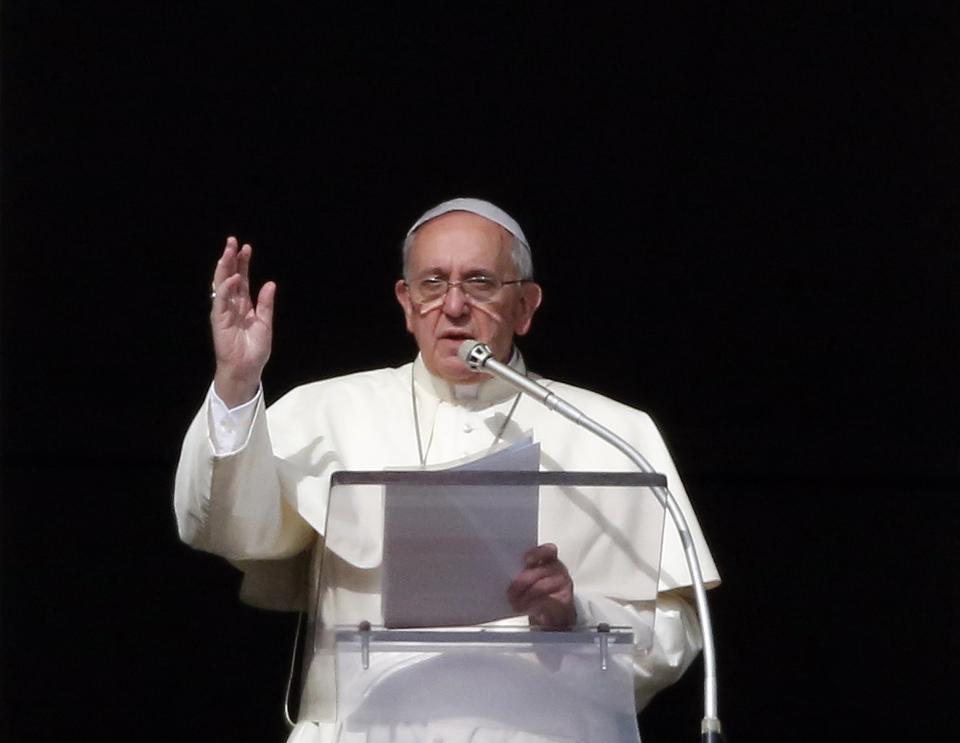 Pope Francis delivers a speech during the Angelus prayer from the window of the Apostolic palace in Saint Peter's Square at the Vatican