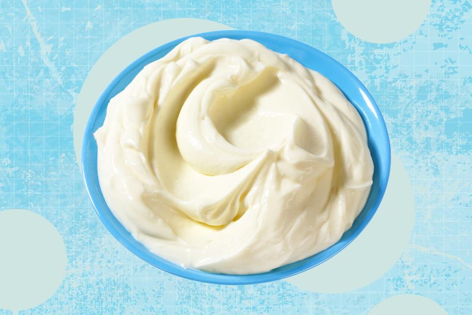 a bowl of cream cheese on a frozen textured background